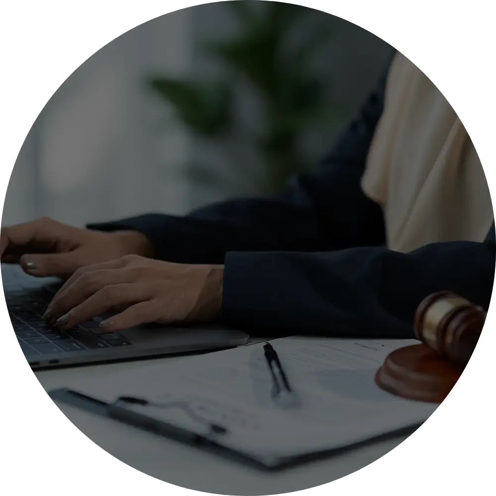 lawyer typing on laptop using ip law resources form BlackHills AI