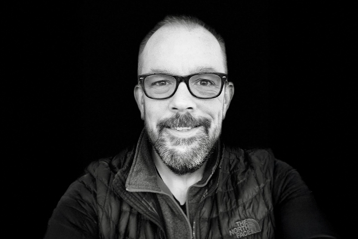 Portrait of Jim Hallenbeck who is the founder & CEO of Black Hills AI who uses his decades of experience as a IP attorney to bring valuable services & tools to the IP industry.