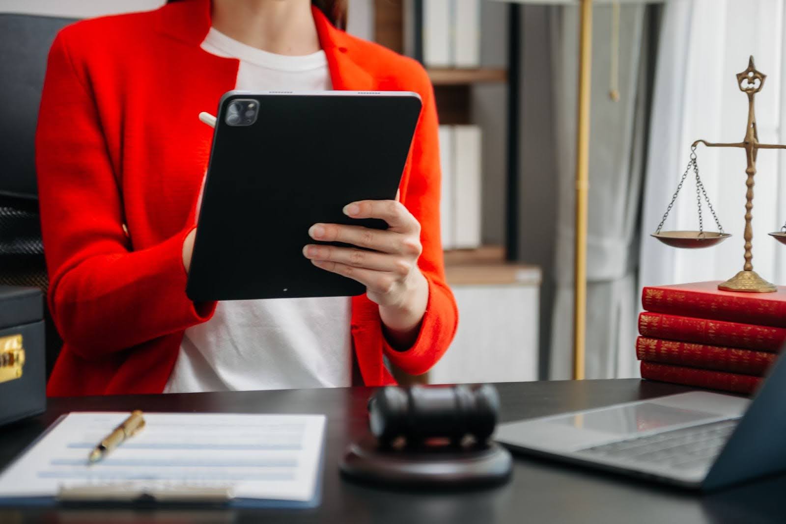 An IP professional using technology after addressing AI security concerns when adopting IP solutions.